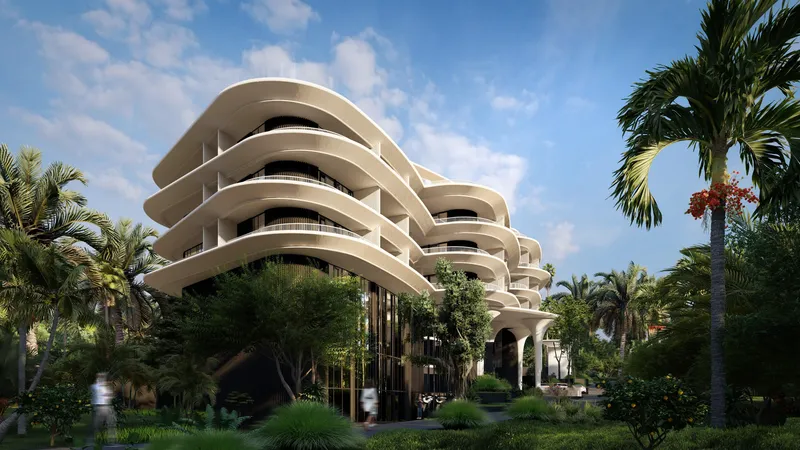 Mandrem: the main building's sweeping balconies among the palms