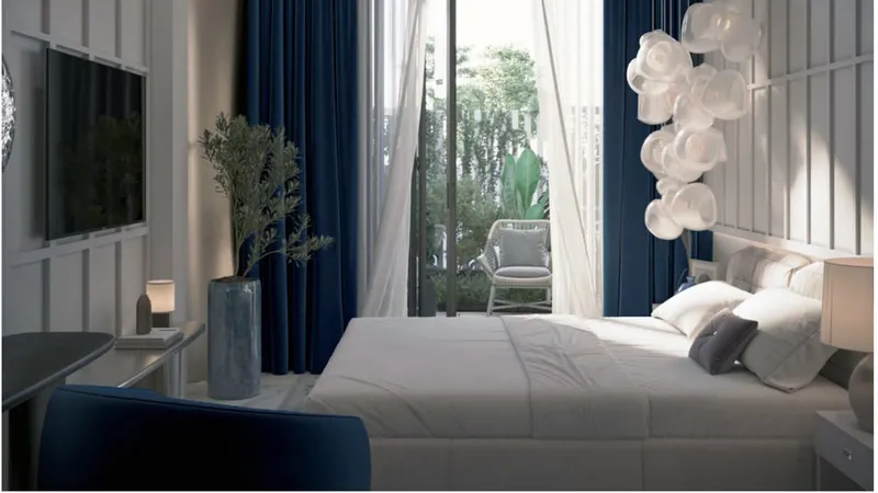 Villa bedroom opening onto a private deck